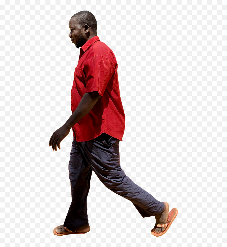 Red Shirt Walking U2013 Afrikut - African Person Walking Png Emoji,Person Walking Png